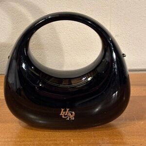 Elegant Black Handbag by Huda Beauty